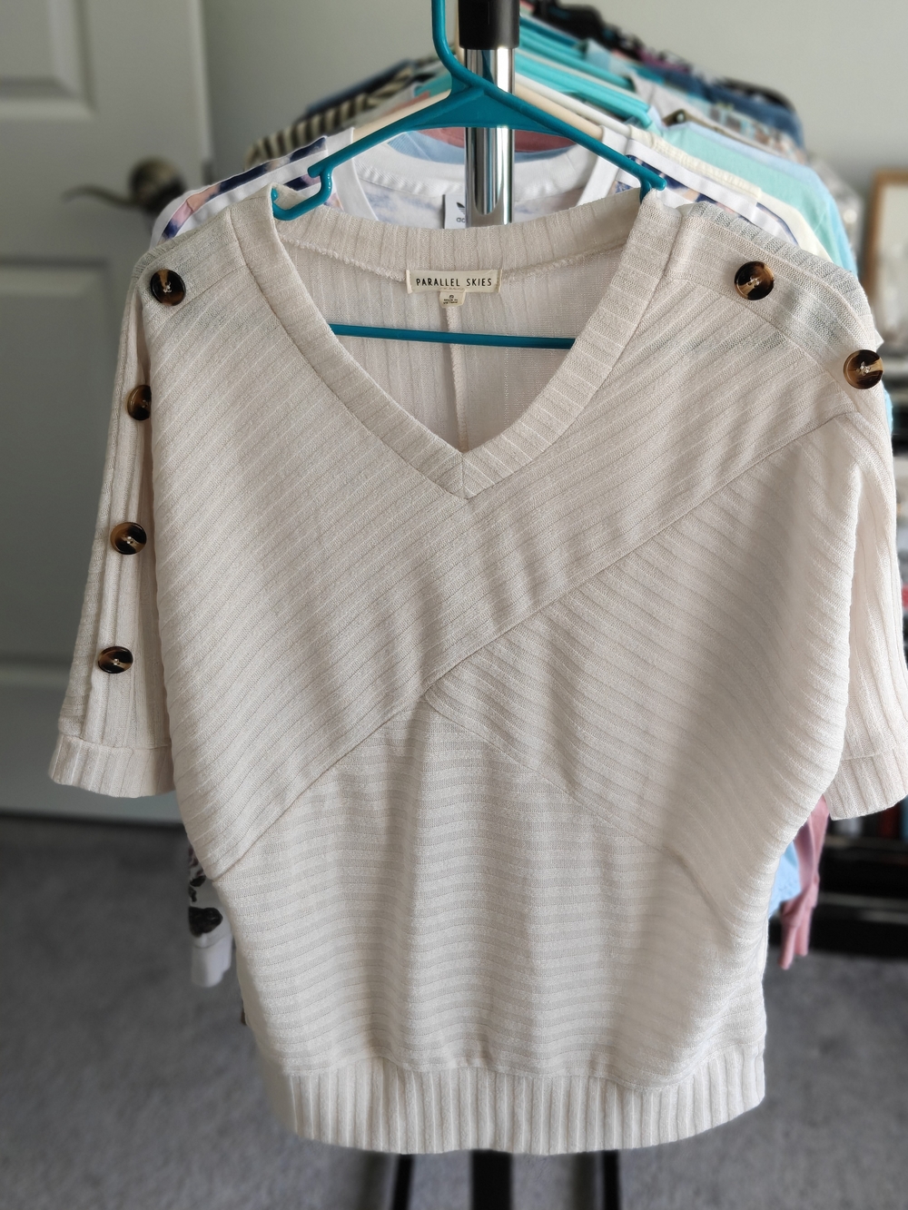Parallel Skies Cream V-Neck Short Sleeve Sweater with Button Shoulder Detail